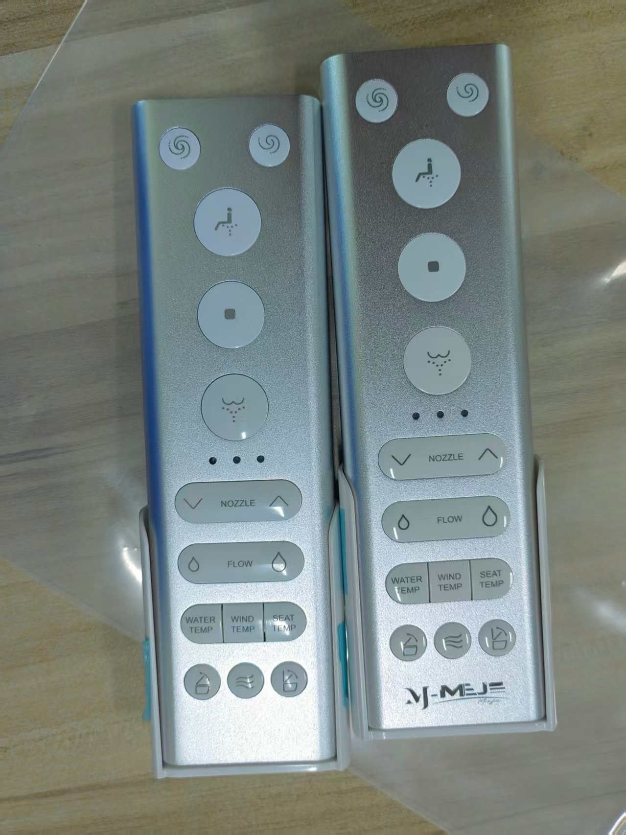 Two remote controls are compatible with the MZE013 smart toilet.